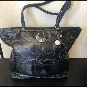 Black Coach handbag with White C stitching